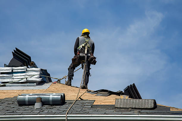 Professional Storm Damage Roof Repair technician working in South Barre, MA